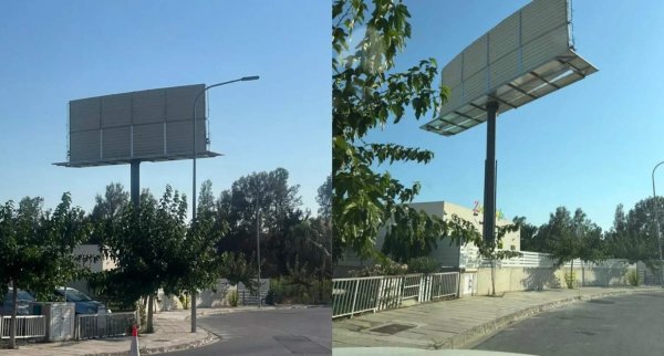 Larnaca'da Anaokulunun Yanında Dev Reklam Panosu